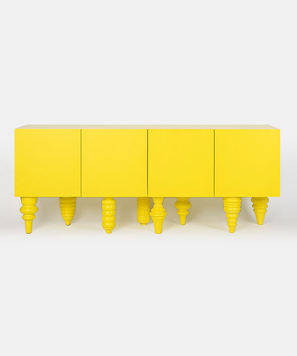 100281. sideboard on object stand yellow